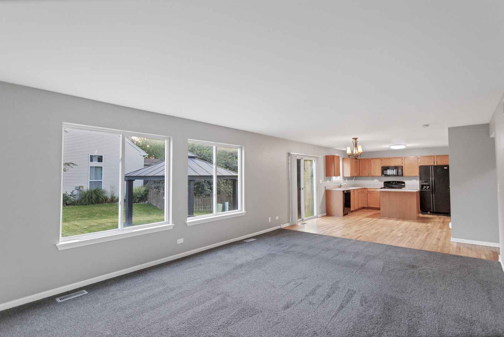 85 Old Post Road Oswego, IL 60543 - Photo 10 of 38 a view of a livingroom with furniture and a window