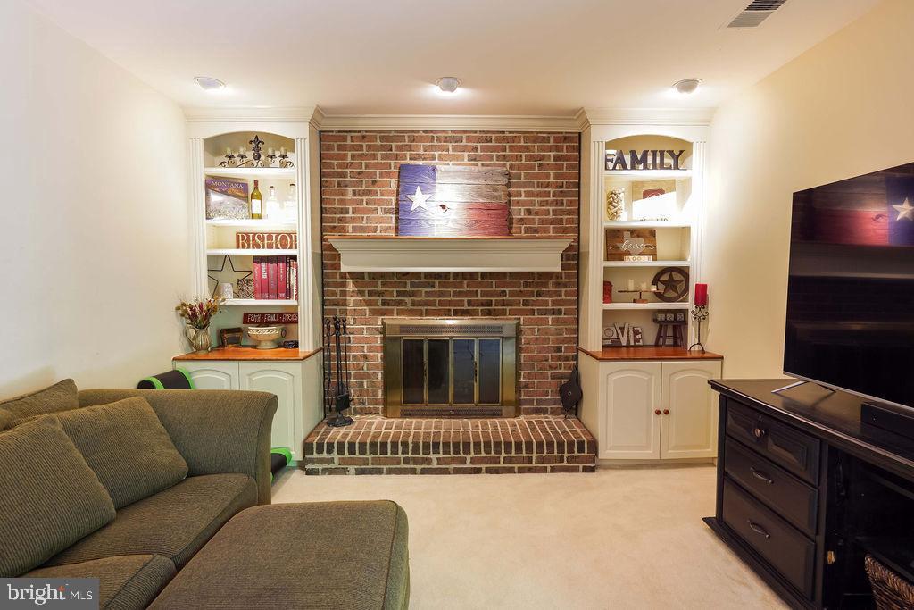 8292 Lindside Way Springfield, VA 22153 - Photo 20 of 51 wood burning fireplace in family room