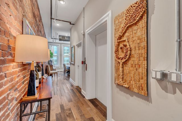 a view of a living room and dining room