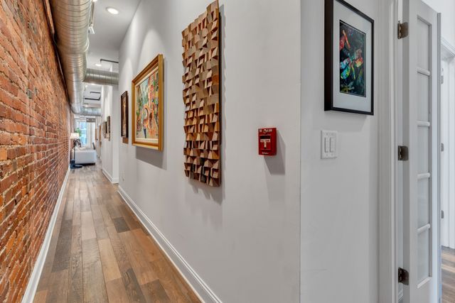 a bathroom with a tub and shower