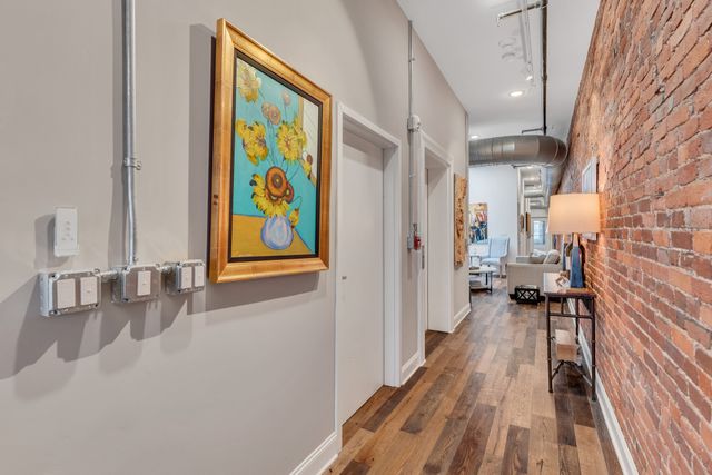 a kitchen with a stove and a sink