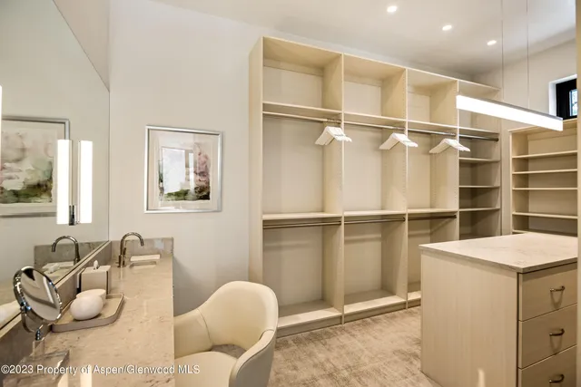 a living room with fireplace furniture and a flat screen tv