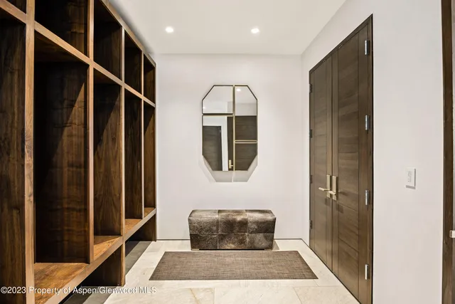 a backyard of a house with outdoor seating