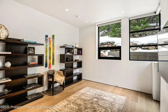 a outdoor living space with furniture and a fireplace