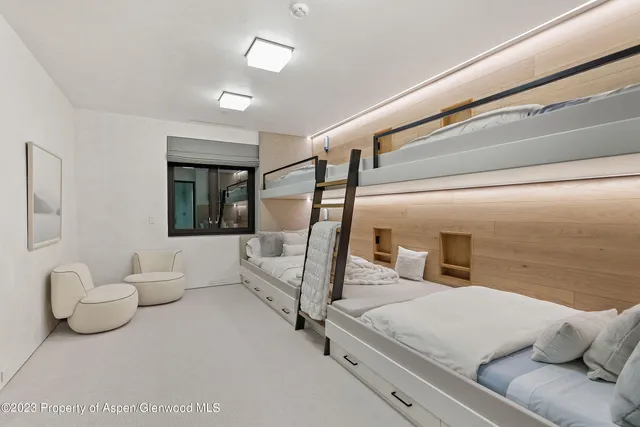 an aerial view of a house with a garden