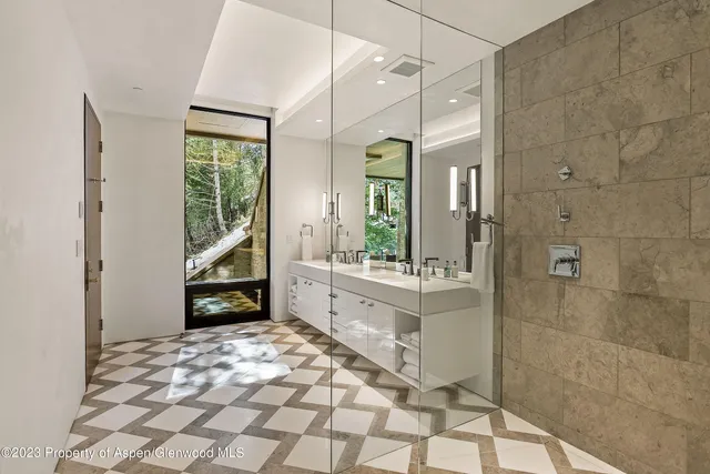 a view of a backyard with sitting area