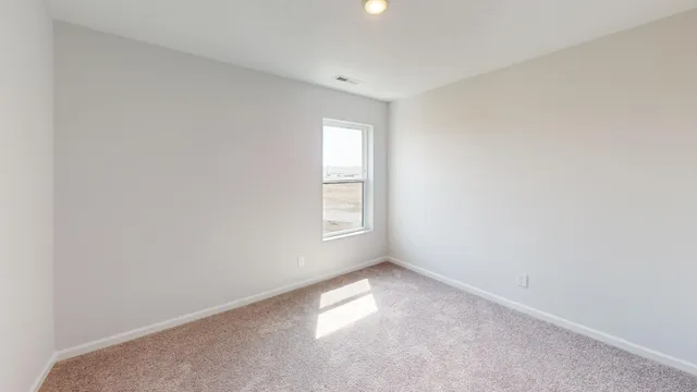 an empty room with a window