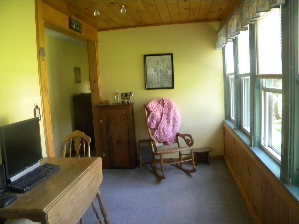 1170 Mullen Road Stetson, ME 04488 - Photo 10 of 19 Year round heated sun porch lets in...