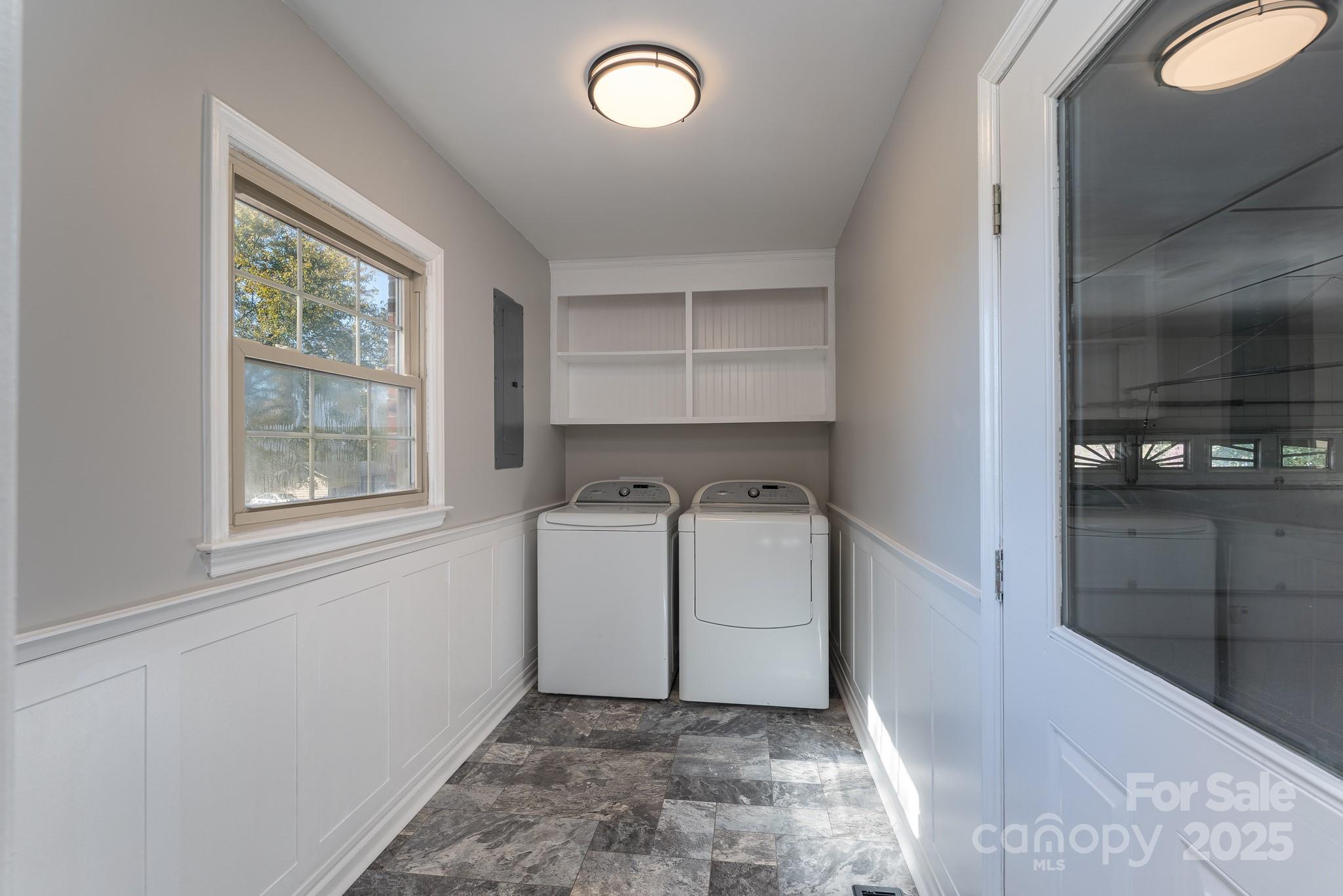 3105 West Zion Church Road Shelby, NC 28150 - Photo 12 of 44 a utility room with cabinets washer and dryer