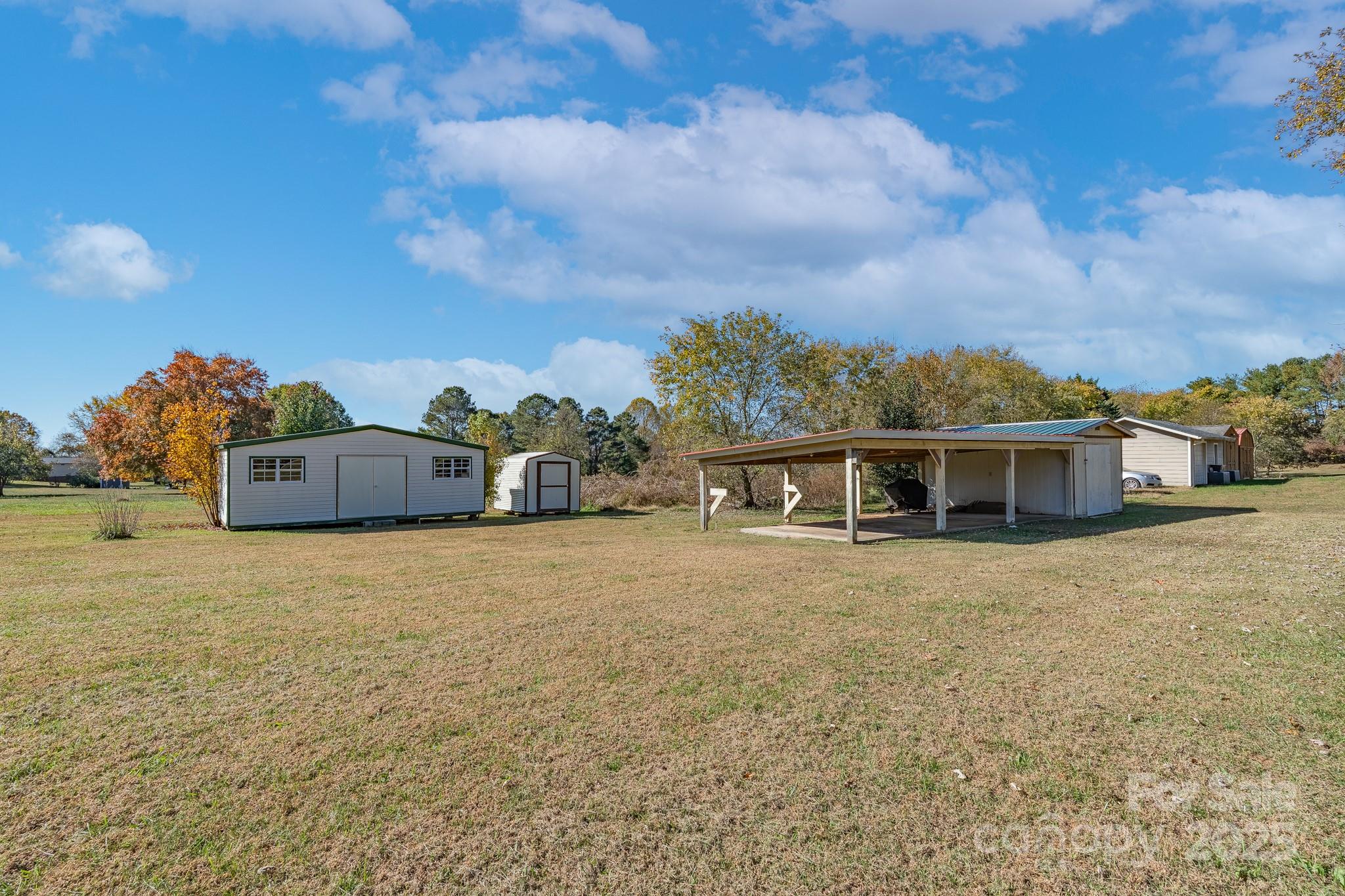 3105 West Zion Church Road Shelby, NC 28150 - Photo 35 of 44 a front view of a house with a garden