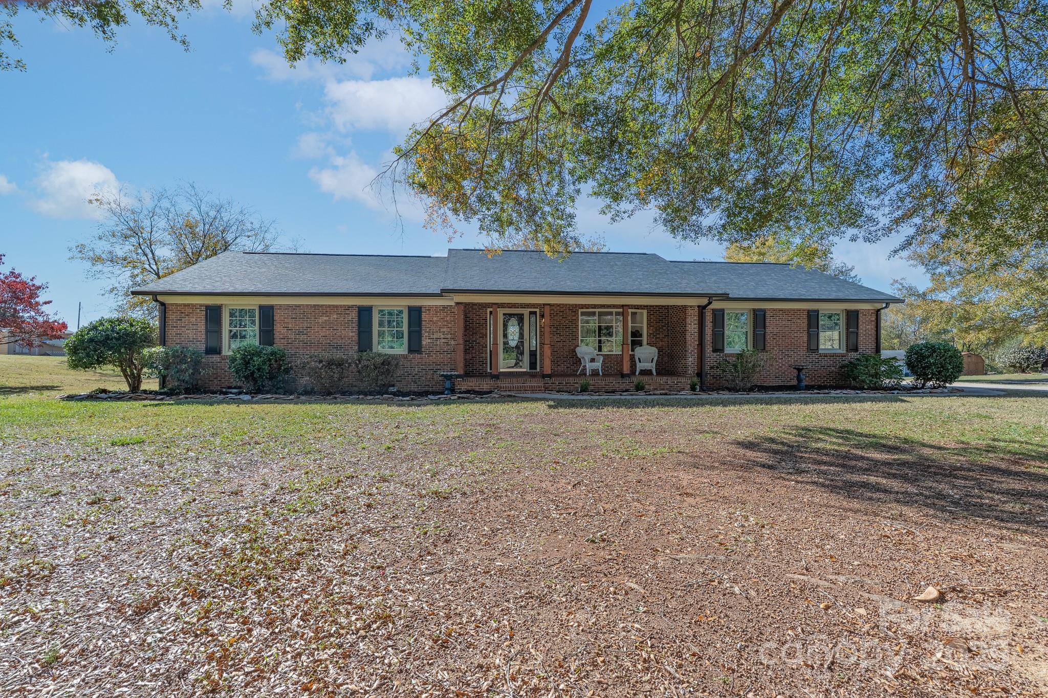 3105 West Zion Church Road Shelby, NC 28150 - Photo 4 of 44 a front view of a house with a yard