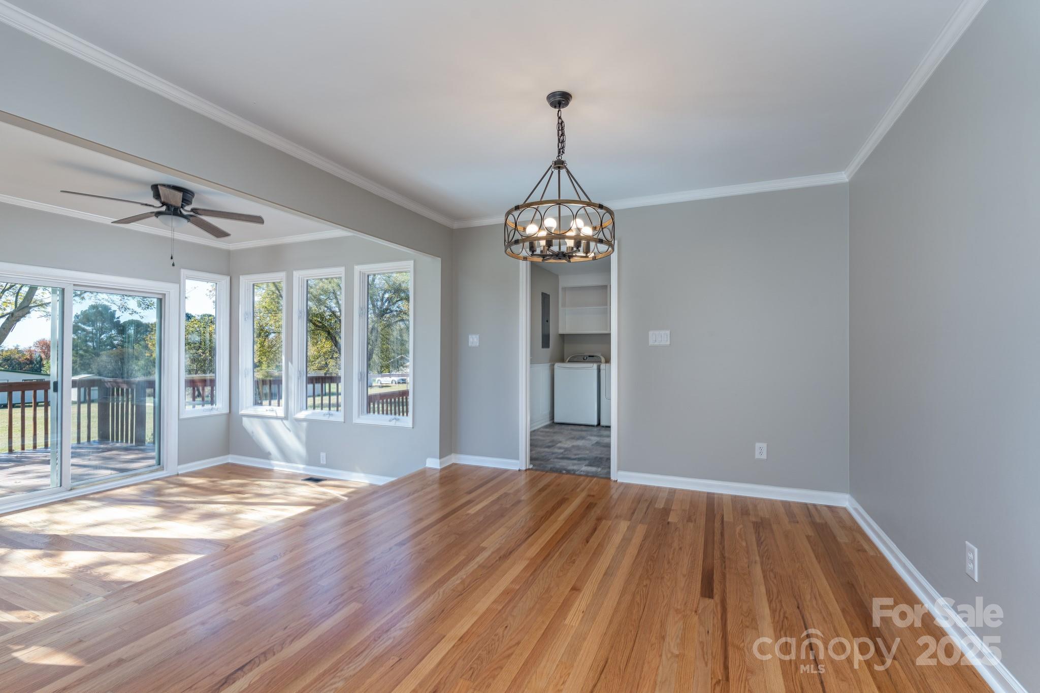 3105 West Zion Church Road Shelby, NC 28150 - Photo 9 of 44 a view of empty room with wooden floor and fan