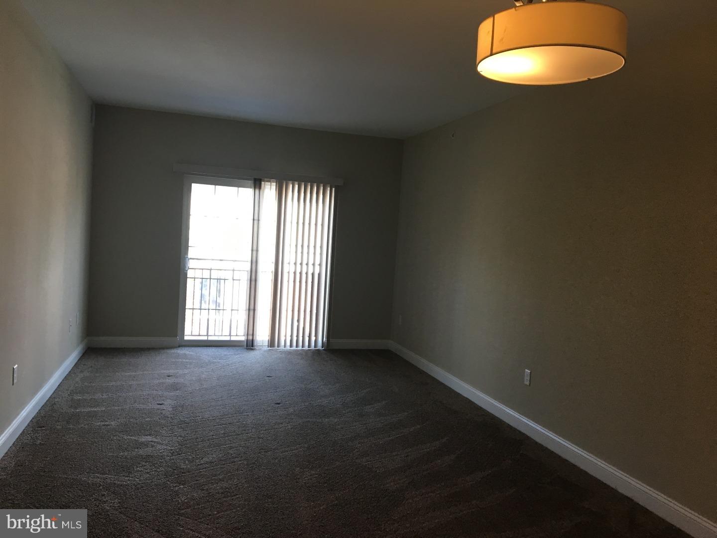 9 North 7th Street, Unit B Perkasie, PA 18944 - Photo 6 of 19 an empty room with a window