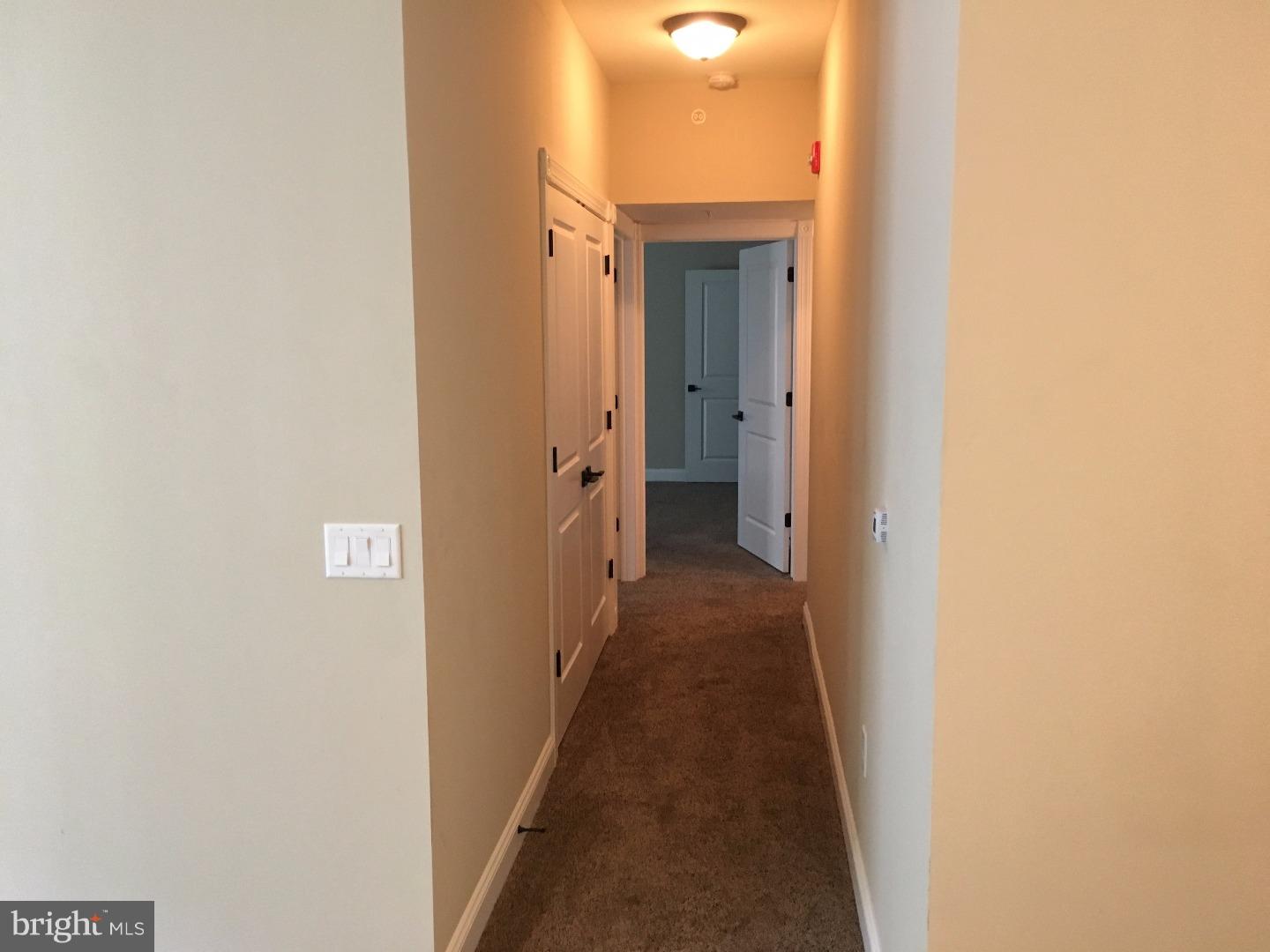 9 North 7th Street, Unit B Perkasie, PA 18944 - Photo 7 of 19 a view of a bathroom from a hallway