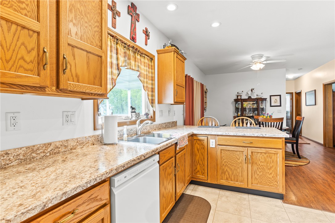 4222 Ramsey Road Springfield, OH 45502 - Photo 44 of 79 This spacious kitchen offers ample cabinetry, modern appliances, and convenient dining area access.
