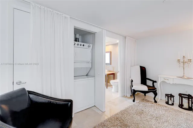 a living room with furniture and a piano