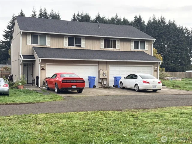 a car parked in front of a house