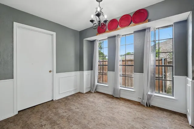 a view of an entryway and livingroom