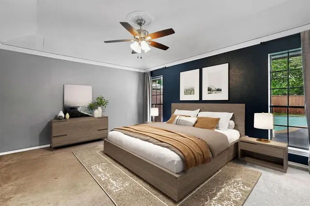 a bedroom with a large bed and a window