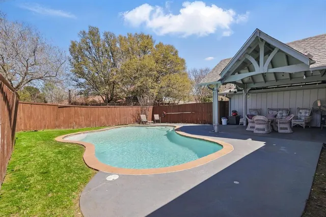 a view of outdoor space yard and swimming pool