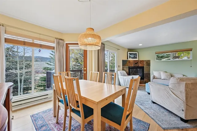 a view of a dining room with furniture and a table