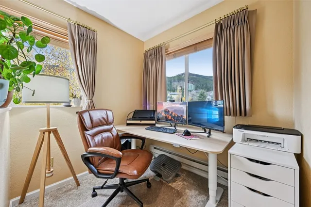 a bedroom with a bed and a cabinets
