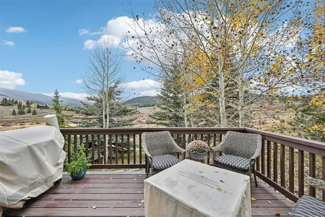 a view of a house with a tree
