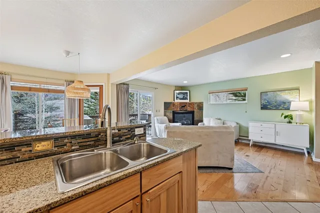 a kitchen with a refrigerator stove and microwave