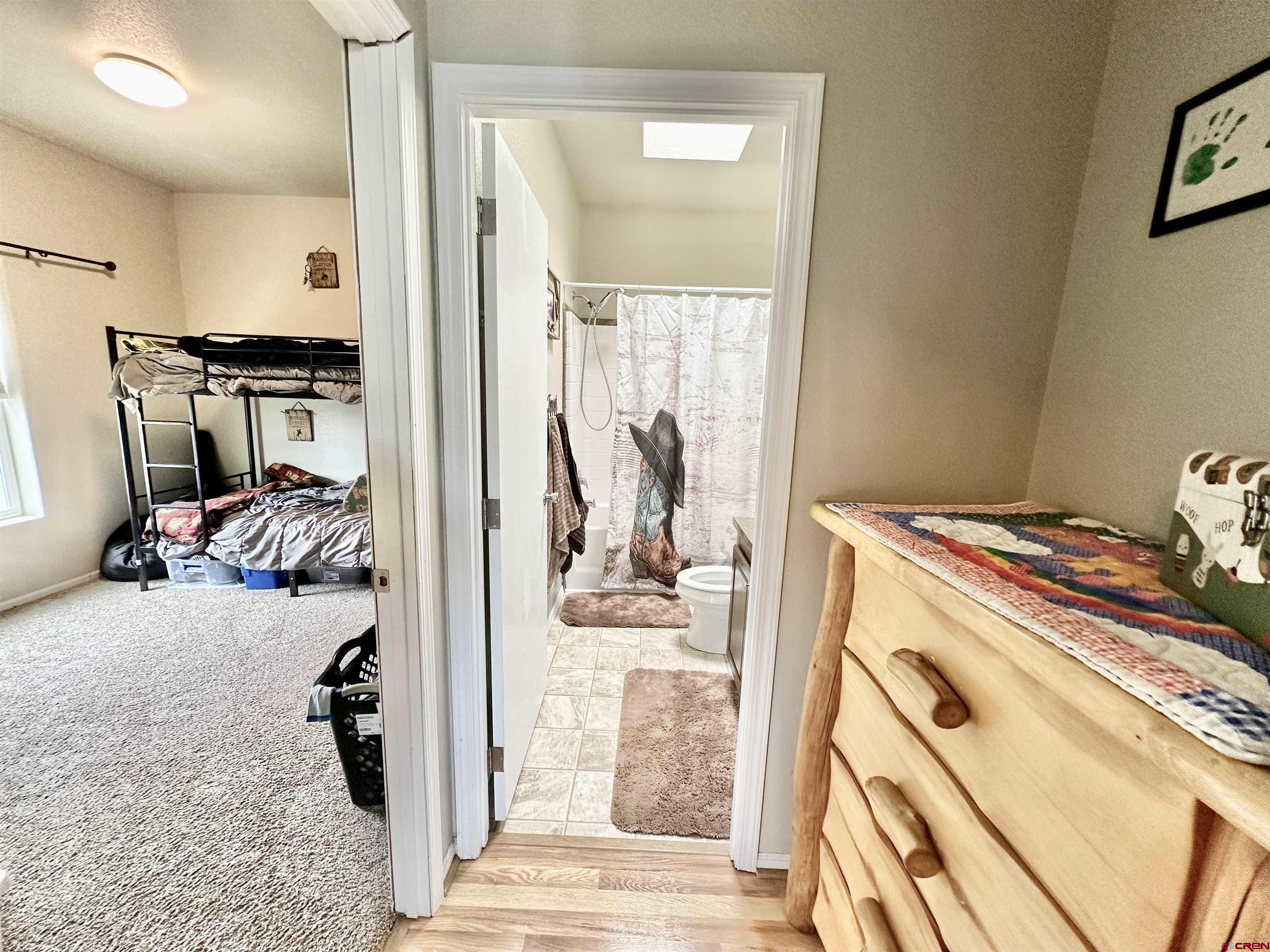 1678 Log Cabin Road Delta, CO 81416 - Photo 22 of 35 a view of walk in closet with clothes and shoes