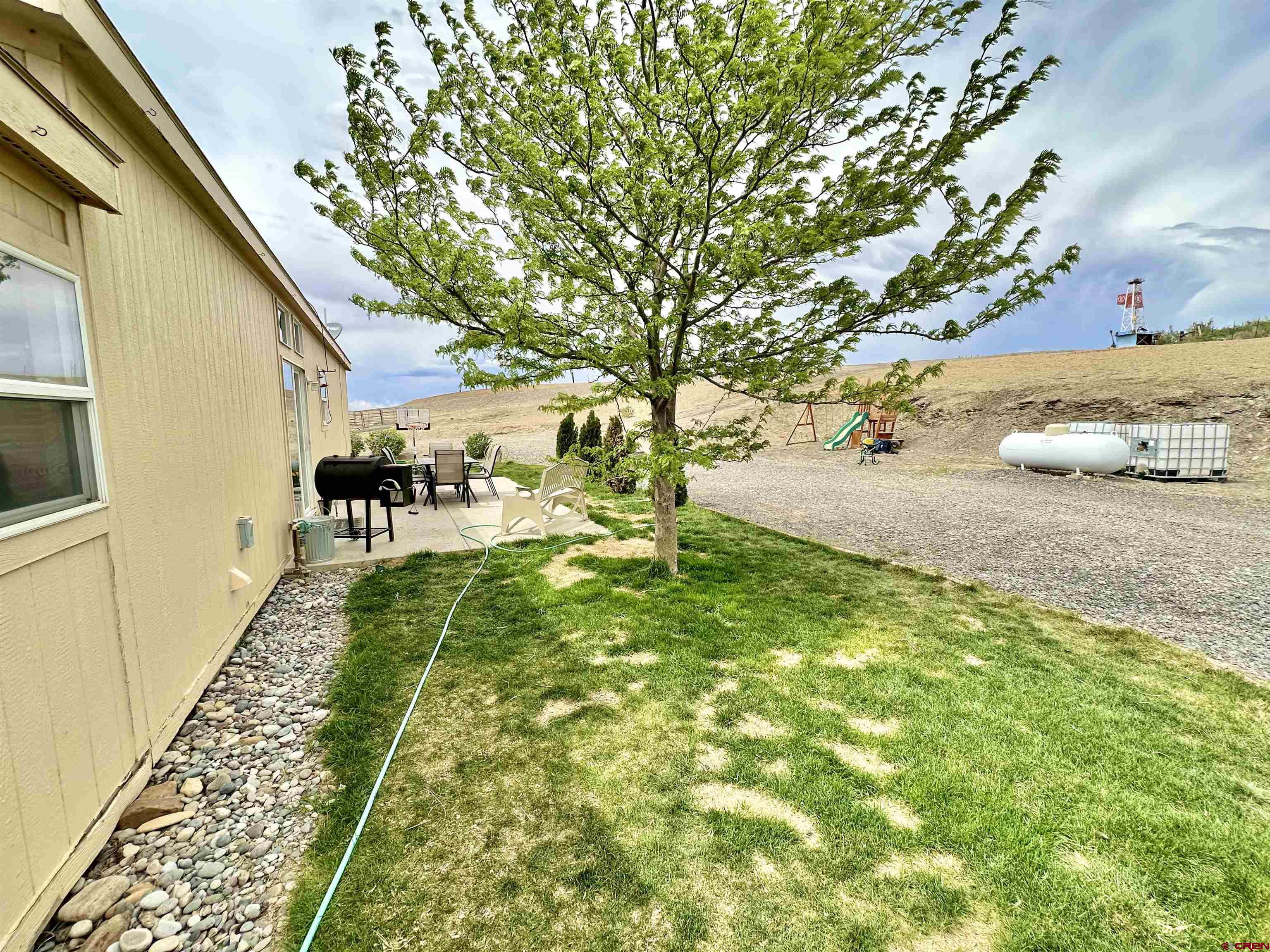 1678 Log Cabin Road Delta, CO 81416 - Photo 31 of 35 a view of yard with seating area