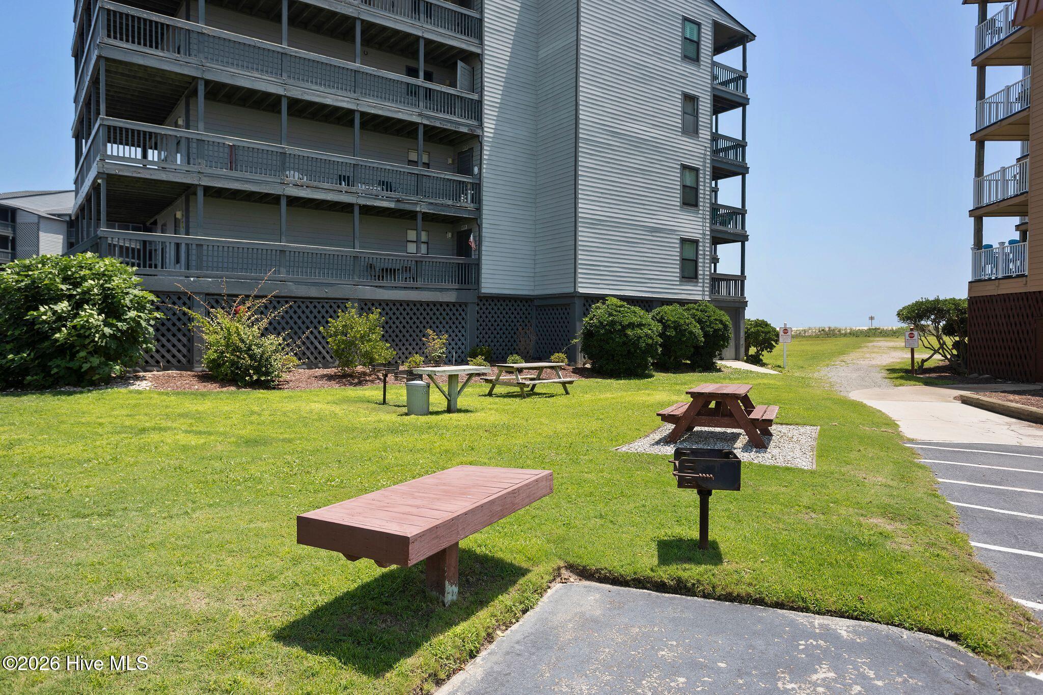 1896 New River Inlet Road, Unit 1119 North Topsail Beach, NC 28460 - Photo 38 of 39 Community Grill & Picnic Area