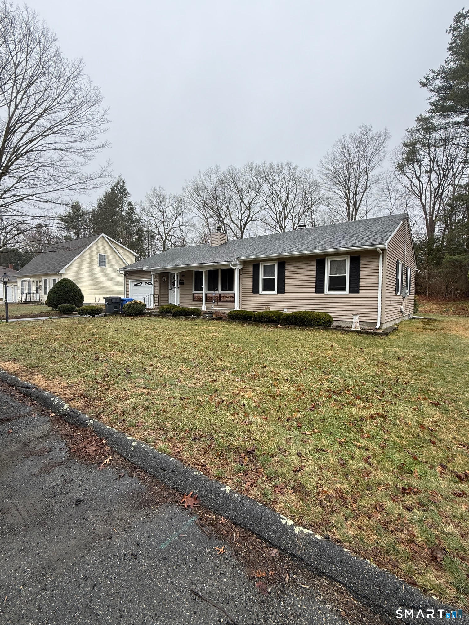 43 Woodward Street Killingly, CT 06239 - Photo 11 of 28 a view of a house with yard and sitting area