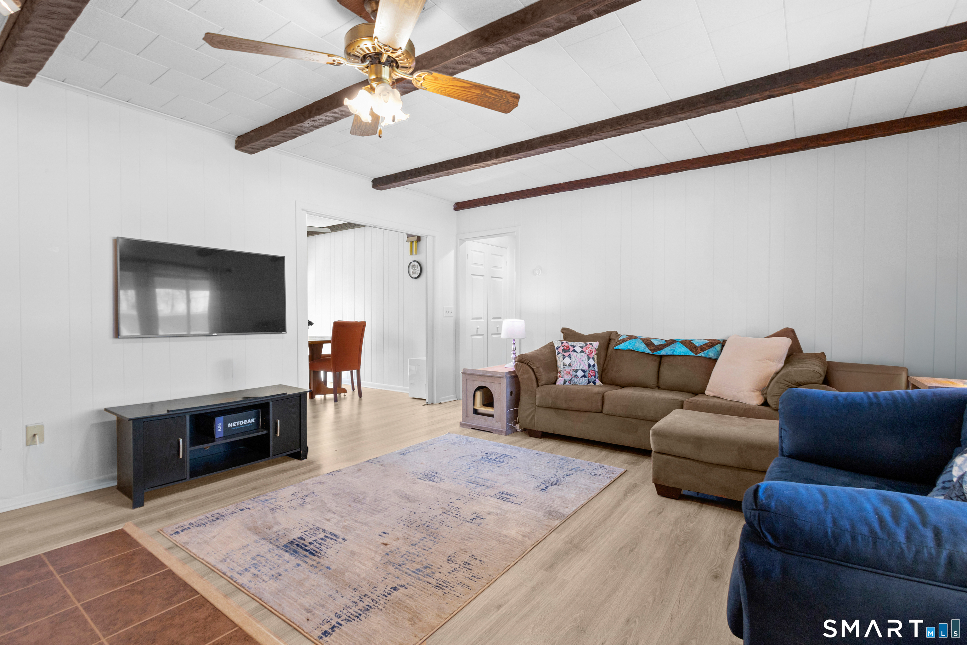 43 Woodward Street Killingly, CT 06239 - Photo 13 of 28 a living room with furniture and a flat screen tv