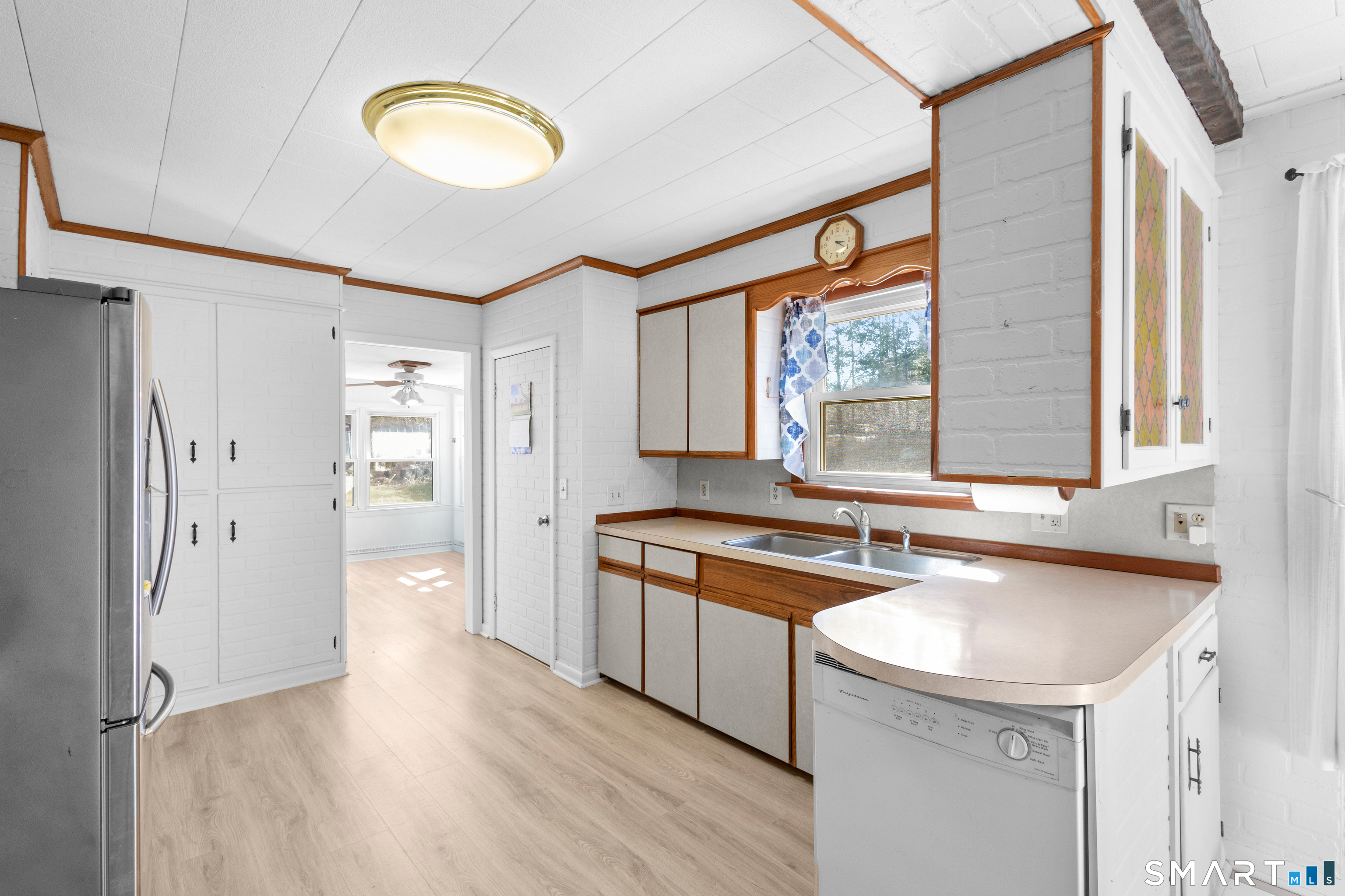 43 Woodward Street Killingly, CT 06239 - Photo 15 of 28 a kitchen with a sink appliances and cabinets