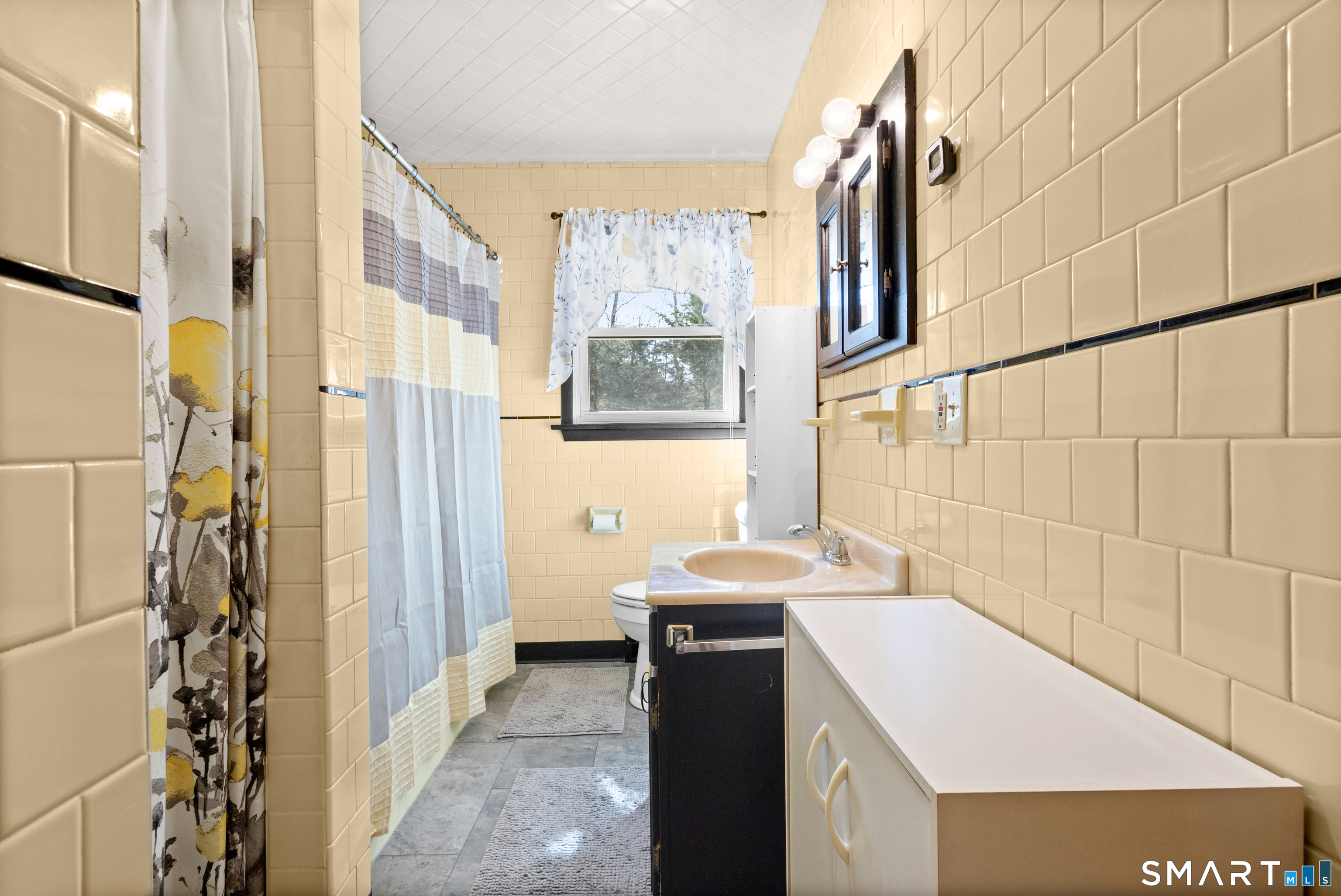 43 Woodward Street Killingly, CT 06239 - Photo 19 of 28 a bathroom with a sink and a mirror