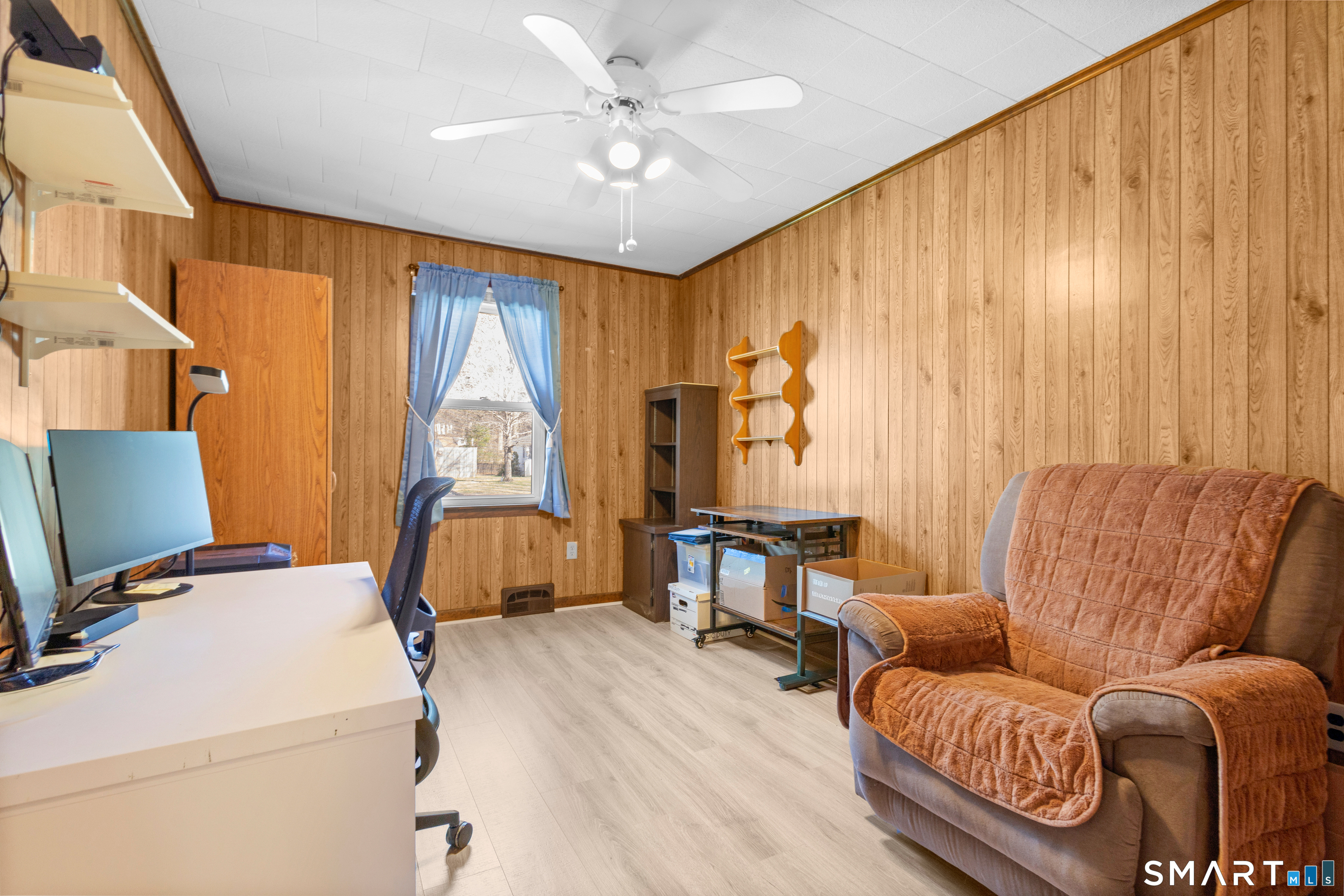 43 Woodward Street Killingly, CT 06239 - Photo 20 of 28 a bed room with furniture and a window