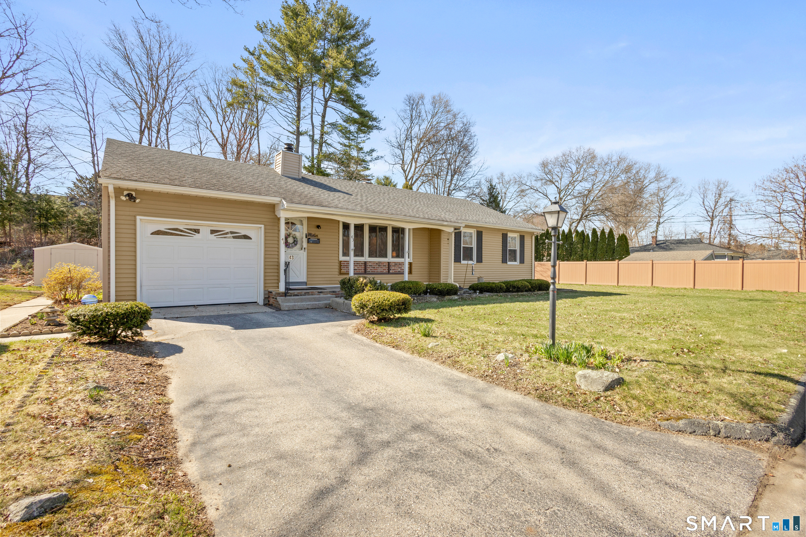 43 Woodward Street Killingly, CT 06239 - Photo 2 of 28 a view of a house with a yard covered in snow