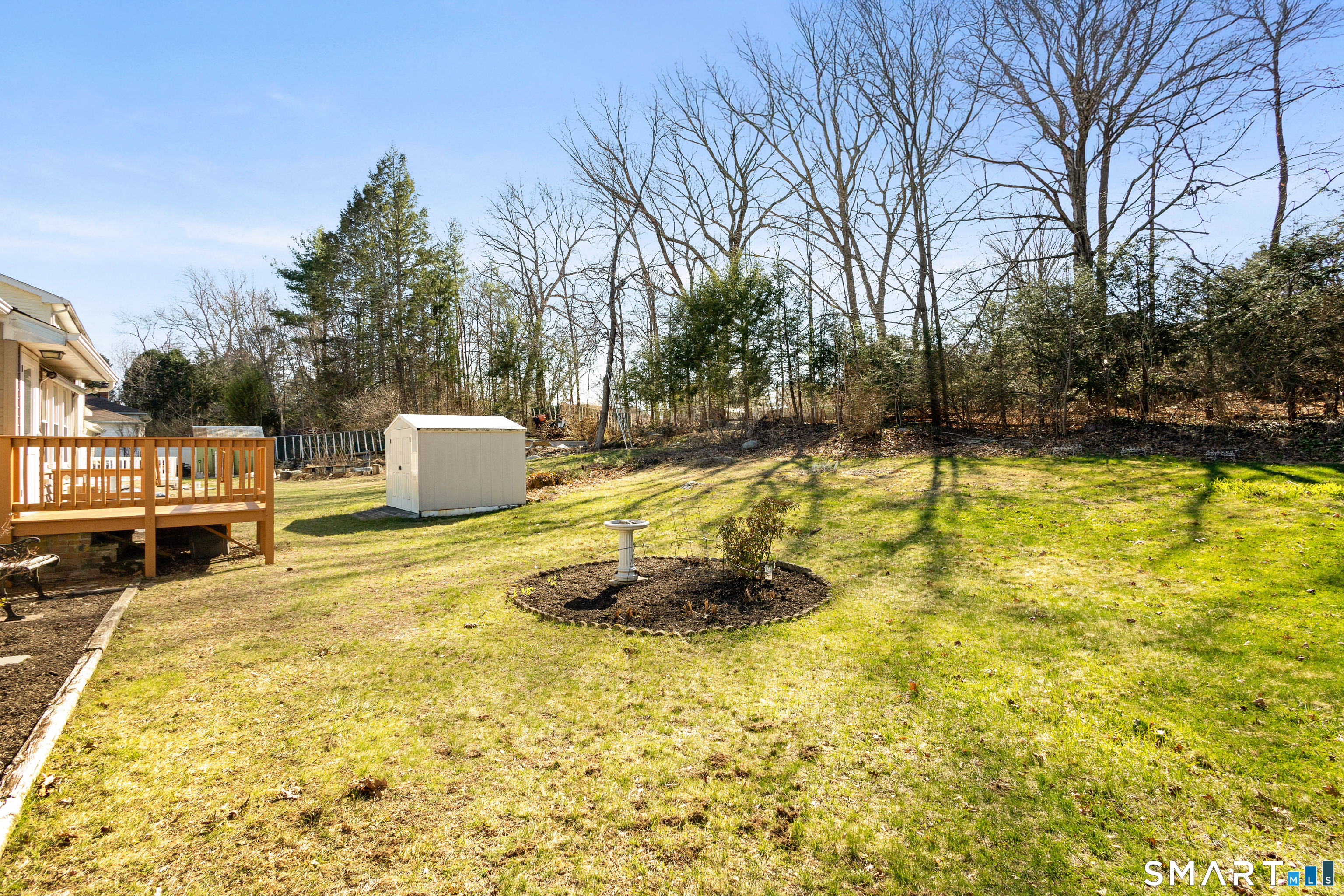 43 Woodward Street Killingly, CT 06239 - Photo 28 of 28 a swimming pool with some trees in the background
