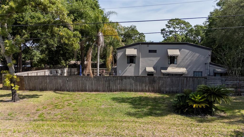 357 Ridgewood Street Altamonte Springs, FL 32701 - Photo 5 of 36 a view of a house with a yard