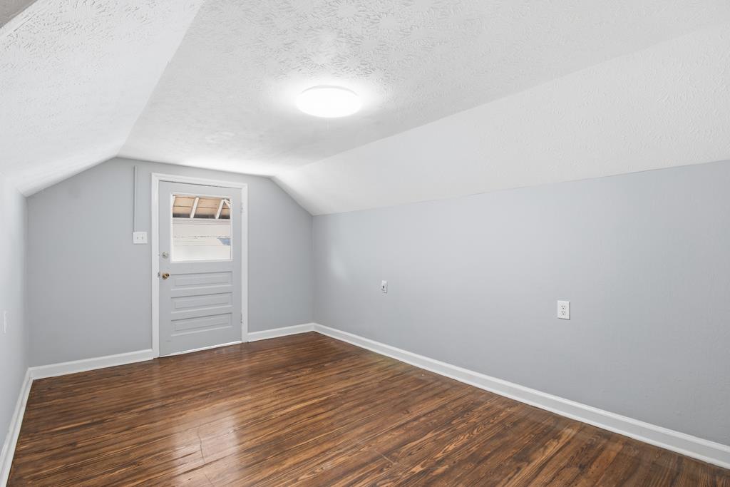 1404 18th Street Columbus, GA 31901 - Photo 9 of 20 wooden floor in an empty room
