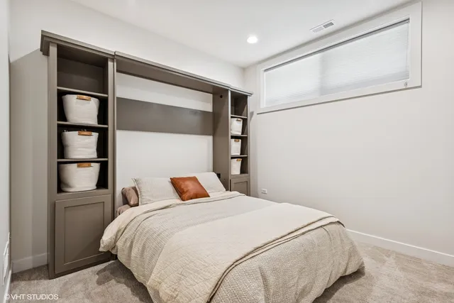 a bedroom with a bed and closet