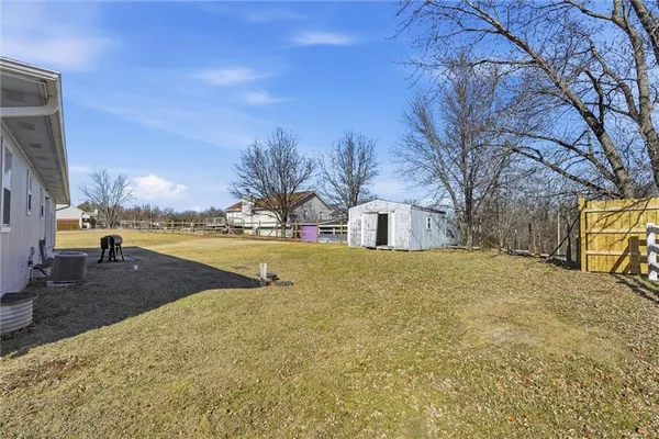 $295,000 | 613 Southeast 150th Street, Warrensburg, MO 64093
