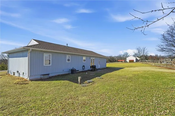 $295,000 | 613 Southeast 150th Street, Warrensburg, MO 64093