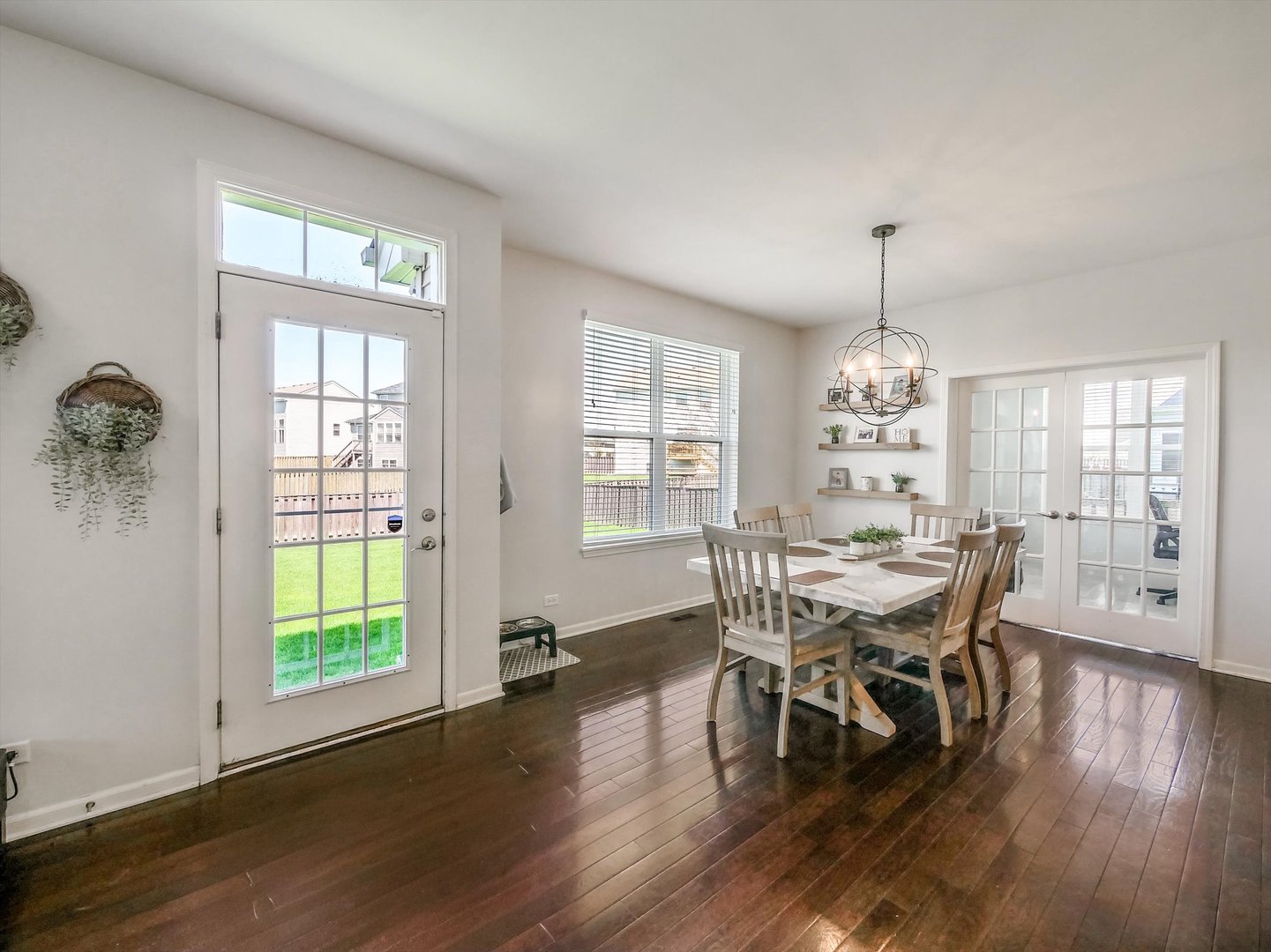 32 Catamaran Circle Pingree Grove, IL 60140 - Photo 12 of 46 a view of a dining room with furniture wooden floor and chandelier