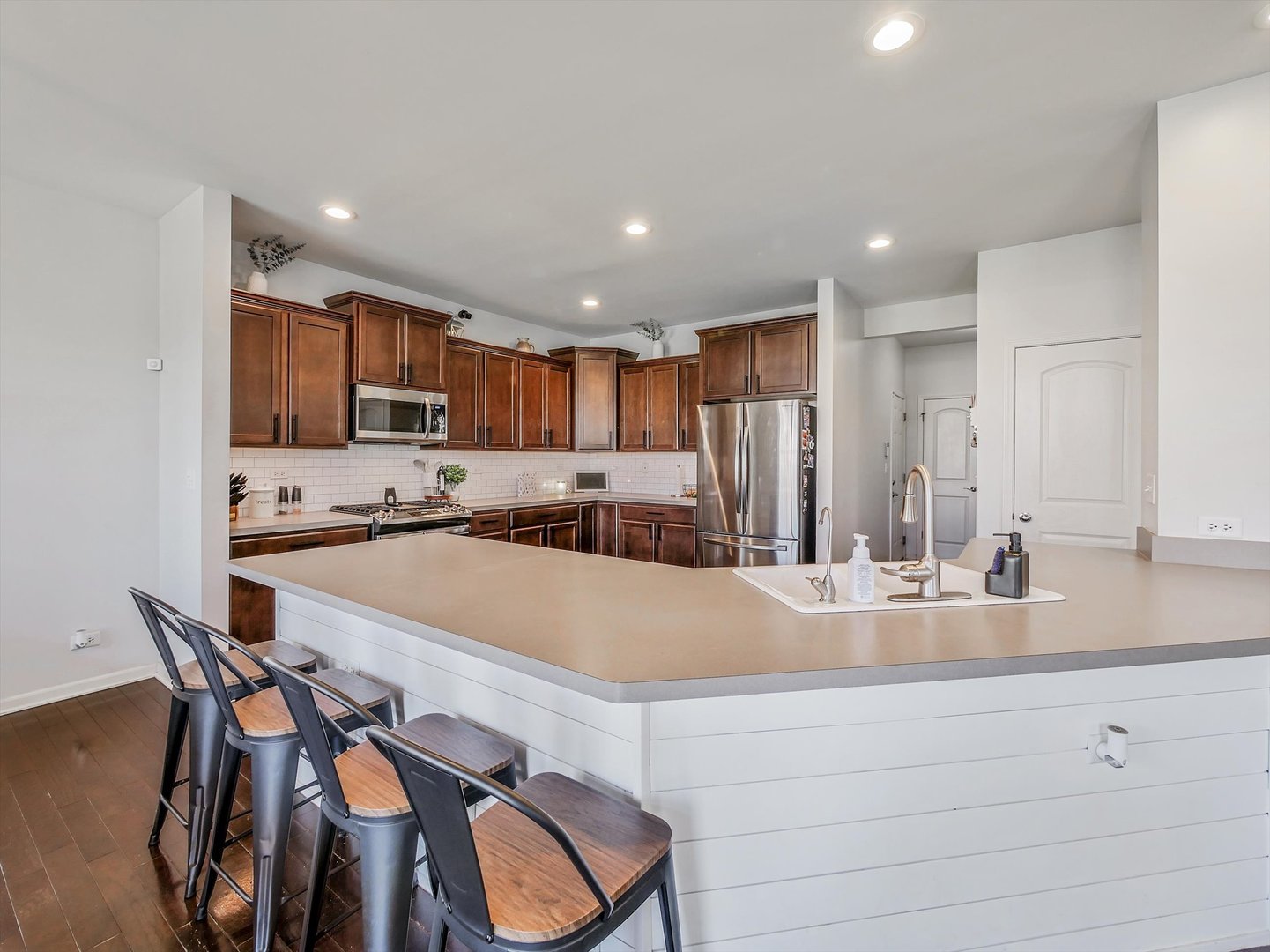 32 Catamaran Circle Pingree Grove, IL 60140 - Photo 13 of 46 a large kitchen with lots of counter space and a sink