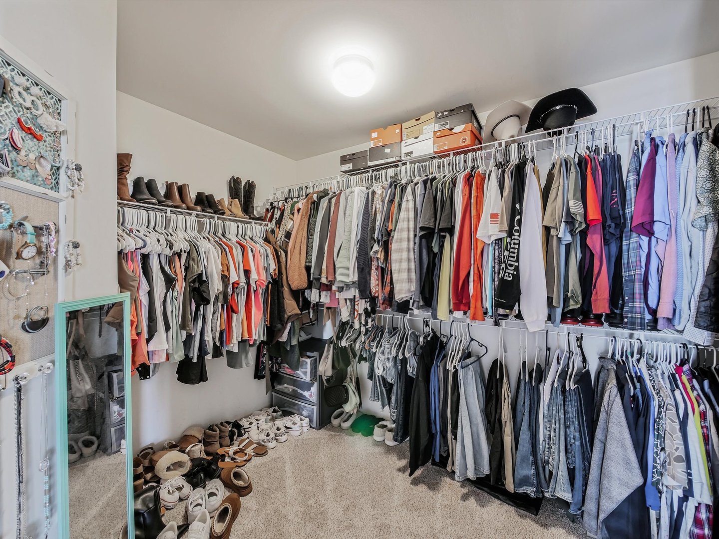 32 Catamaran Circle Pingree Grove, IL 60140 - Photo 21 of 46 a view of walk in closet with clothes