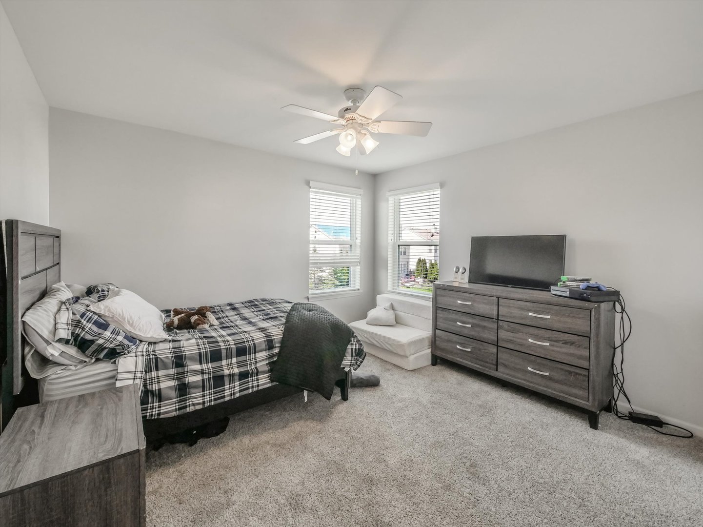 32 Catamaran Circle Pingree Grove, IL 60140 - Photo 29 of 46 a bedroom with furniture and a window