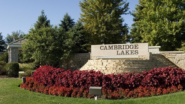 32 Catamaran Circle Pingree Grove, IL 60140 - Photo 39 of 46 a sign on the side of the grass