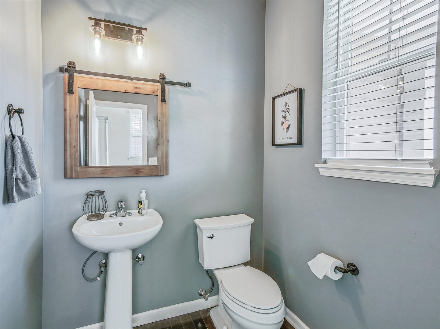 32 Catamaran Circle Pingree Grove, IL 60140 - Photo 7 of 46 a bathroom with a toilet sink and mirror