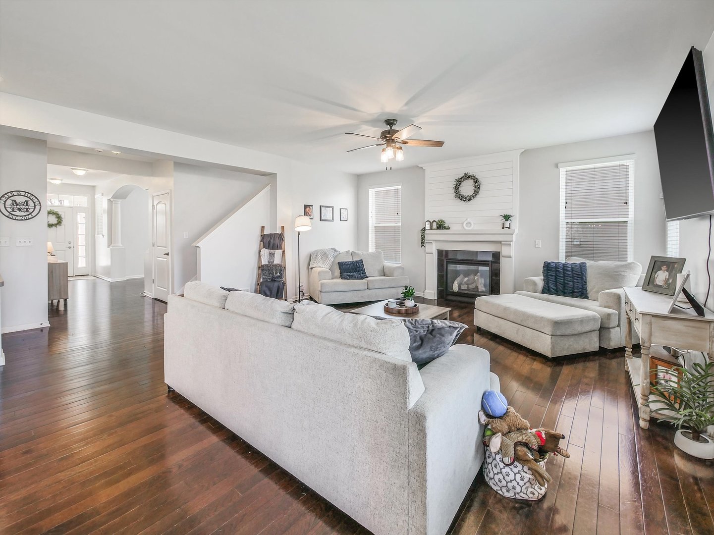 32 Catamaran Circle Pingree Grove, IL 60140 - Photo 9 of 46 a living room with furniture fireplace and a window